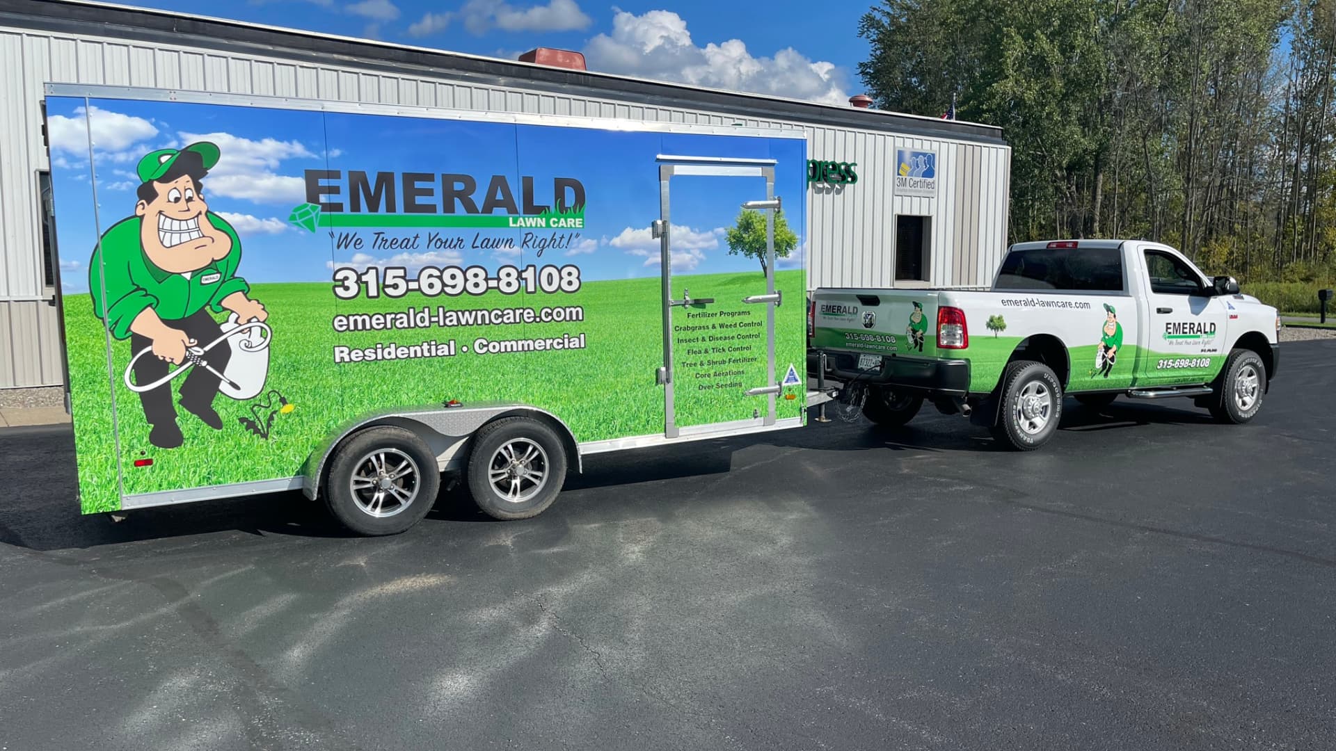 Emerald Lawn Care service vehicles